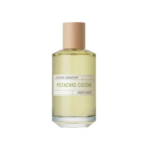 Pistachio Cousin fragrance by Olfactory Laboratory in a sleek glass bottle with a wooden cap.