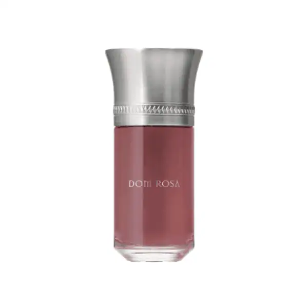 Domi Rosa nail polish bottle with a silver cap.