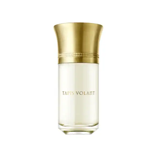 Tapis Volant perfume bottle with gold cap.