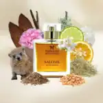 Papillon Salome fragrance bottle with citrus slices and natural ingredients.