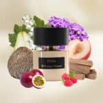 Kirké Miziana Terenzi fragrance bottle with natural fruits and herbs background.