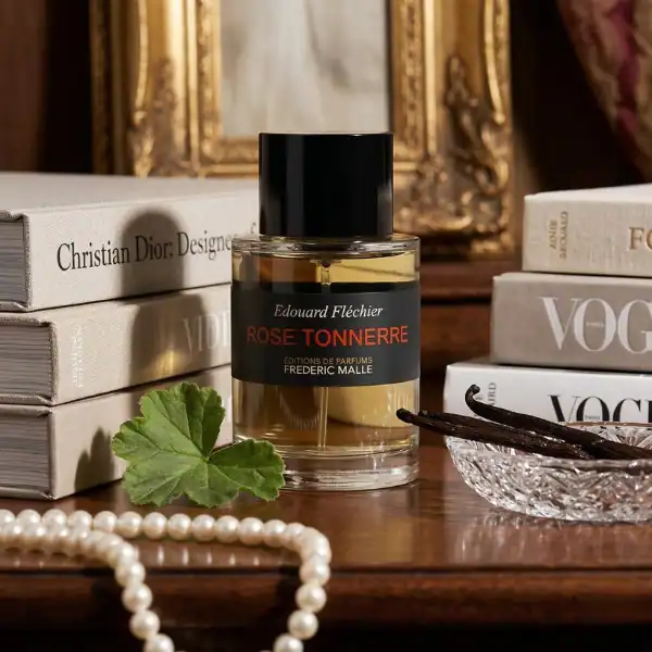 Edouard Flechier Rose Tonnerre perfume bottle with elegant packaging and decorative elements.