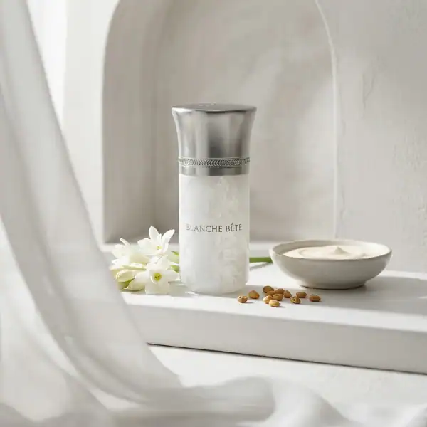 Blanche Bete skincare product in elegant silver and white bottle.