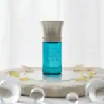 Davis Blue fragrance bottle with elegant silver cap, perfect for luxury perfume collection.