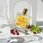 Miller Harris perfume bottle with yellow floral label, high-end fragrance for women.