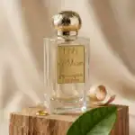 Noble 1942 Ponte Vecchio fragrance bottle, luxury perfume for women, displayed on a wooden surface.