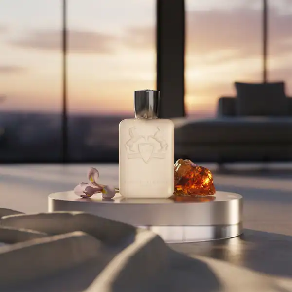 Furla White fragrance bottle with an amber gemstone and delicate flower petals.