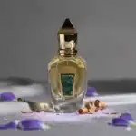 Xerjoff Irisss fragrance bottle with gold cap and green label.