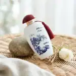 Blue Tea ceramic bottle with traditional blue and white design, perfect for elegant home decor or gi.