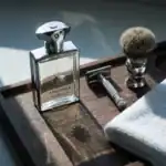 Refined men's grooming essentials with elegant perfume and accessories for a sophisticated look.