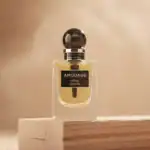 Orris Wakan fragrance by Amouage, elegant perfume bottle with black cap, luxury scent.