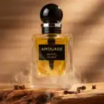 Amouage Santal Sohar fragrance bottle with black cap and gold liquid.
