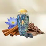 The Merchant of Venice perfume bottle with detailed artwork, complemented by cinnamon sticks, dried.