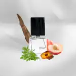 Filippo Sorcinelli Rosa Nigra fragrance bottle with natural ingredients and peach.