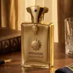A high-end niche perfume in a sophisticated gold bottle with jewelry-inspired embellishments.