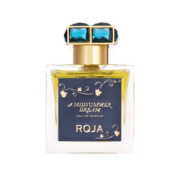 Elegant perfume bottle featuring blue gemstones and floral motifs for a luxurious scent.