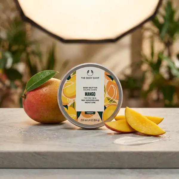The Body Shop Mango Body Butter - A luxurious skincare product available at Beautinow.