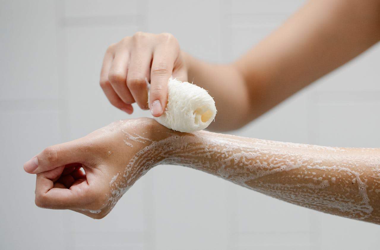 how to remove perfume scent from skin