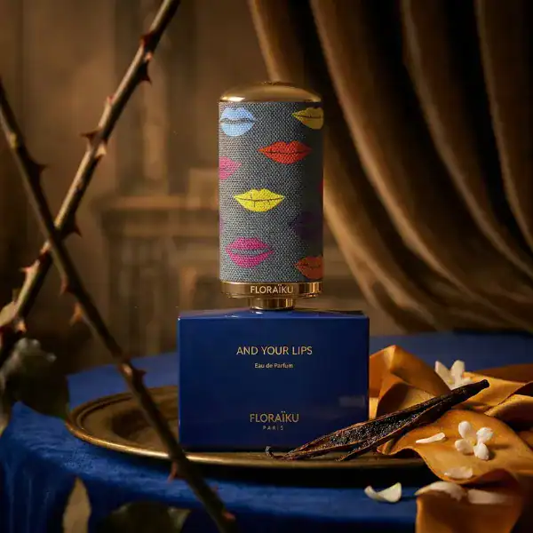 Floraiku And Your Lips perfume bottle with colorful lips design, elegant and artistic.