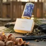 Floraiku Golden Eyes fragrance bottle, elegant and artistic design.