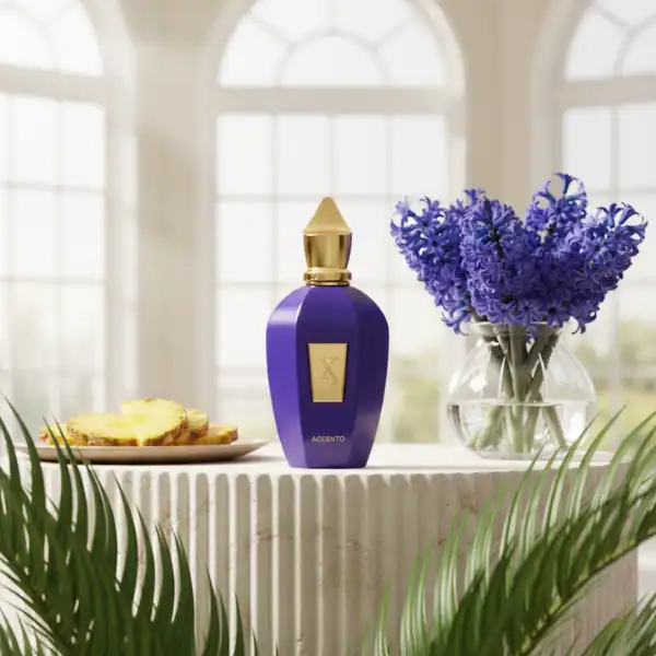 Accent perfume bottle by Alwa, a luxurious fragrance in a sleek purple and gold design.