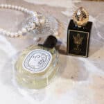 Dptique Perfume Bottle on the floor