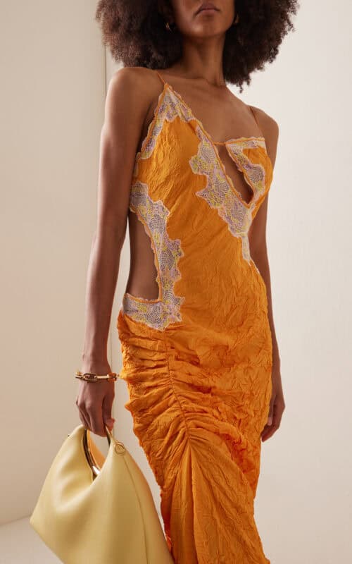 Christopher Esber yellow dress with Perris Monte Carlo perfume