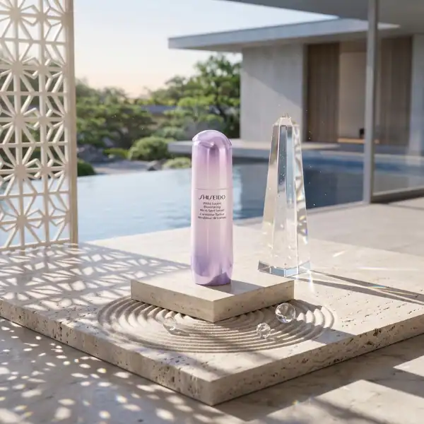 Shiseido skincare product with elegant purple bottle and crystal decor on a modern outdoor terrace.