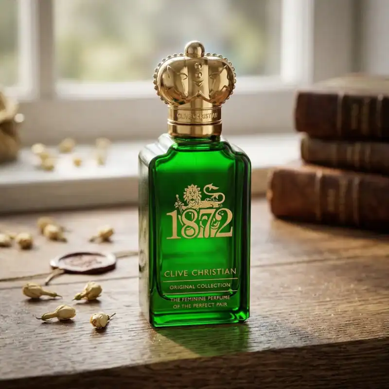 Clive Christian 1872 Green fragrance bottle with a gold crown cap, luxurious and elegant design.