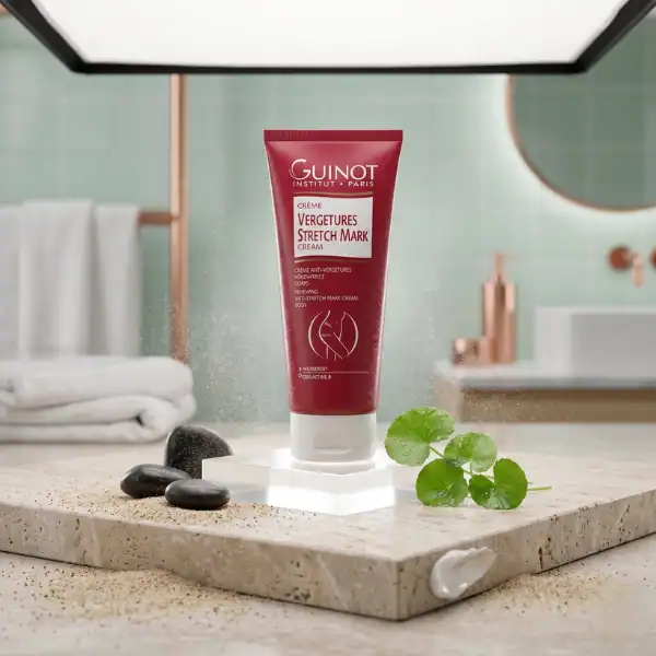 Guinot Vergetures Stretch Mark Cream for skin elasticity and stretch mark prevention, displayed on a.