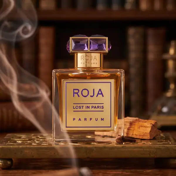 Roja Parfums Lost in Paris fragrance bottle with purple gem cap.