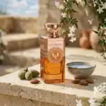 ELECTIMUSS fragrance bottle with rose gold accents.