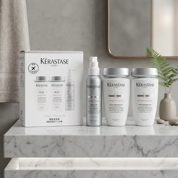 Kérastase Specifique hair loss treatment set with shampoo and scalp serum.