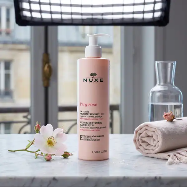 Nuxe Prodigieuse Neroli skincare bottle with soft pink packaging.