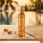 Nuxe Tanning Sun Oil SPF 10 - A luxurious tanning oil available at Beautinow.