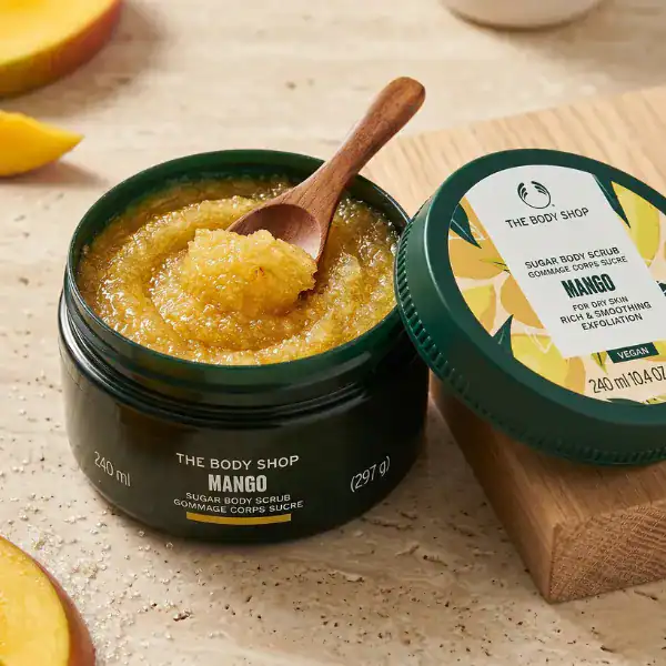 The Body Shop Mango Body Scrub for smooth, radiant skin, available at Beautinow.
