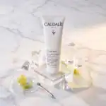 Caudalie Vinoperfect Brightening Micro‑Peeling Foam - A luxurious skincare foam available at Beautin.