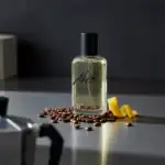 Ake Awake fragrance bottle with coffee beans and lemon peel, luxury scent available at Beautinow.