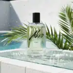 Atho Rise fragrance bottle with black cap, fresh and aquatic scent.