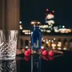 WITTON London perfume bottle with cityscape reflection.