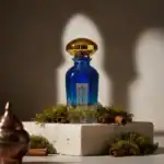 WIDIAN Blue Perfume Bottle - A luxurious fragrance presented in a stunning blue glass bottle at Beau.