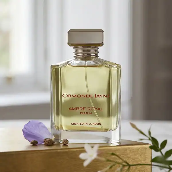 Ormonde Jayne Ambre Royal perfume bottle with a sleek design and soft yellow liquid.