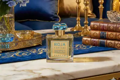 Exquisite rare fragrance with elegant blue accents on vintage-inspired decor.
