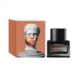 Luxurious Caramelo Vanilla fragrance in sleek black bottle with artistic packaging design.