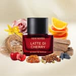 Vibrant cherry perfume bottle surrounded by flowers, citrus slices, and spices.