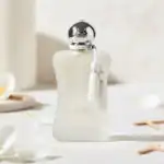 Valaya Exclusive fragrance bottle with elegant silver cap and tassel.