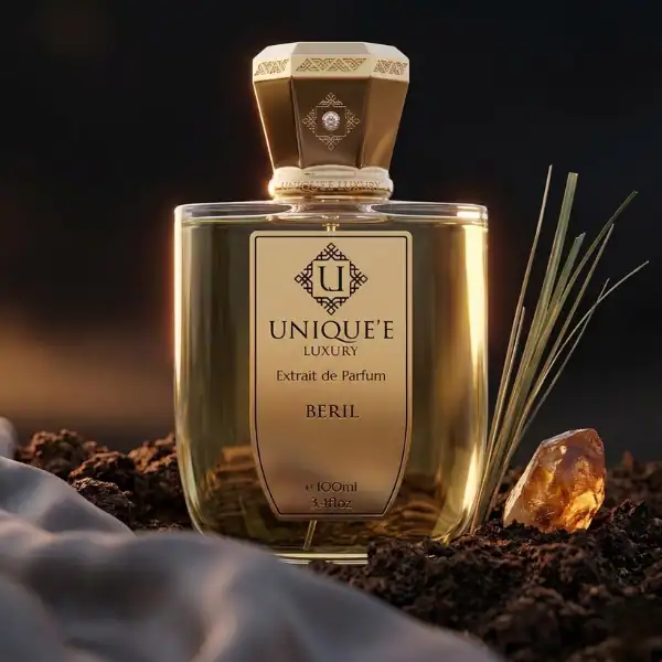 Unique'e Luxury Beril fragrance bottle with elegant gold accents and sophisticated design.