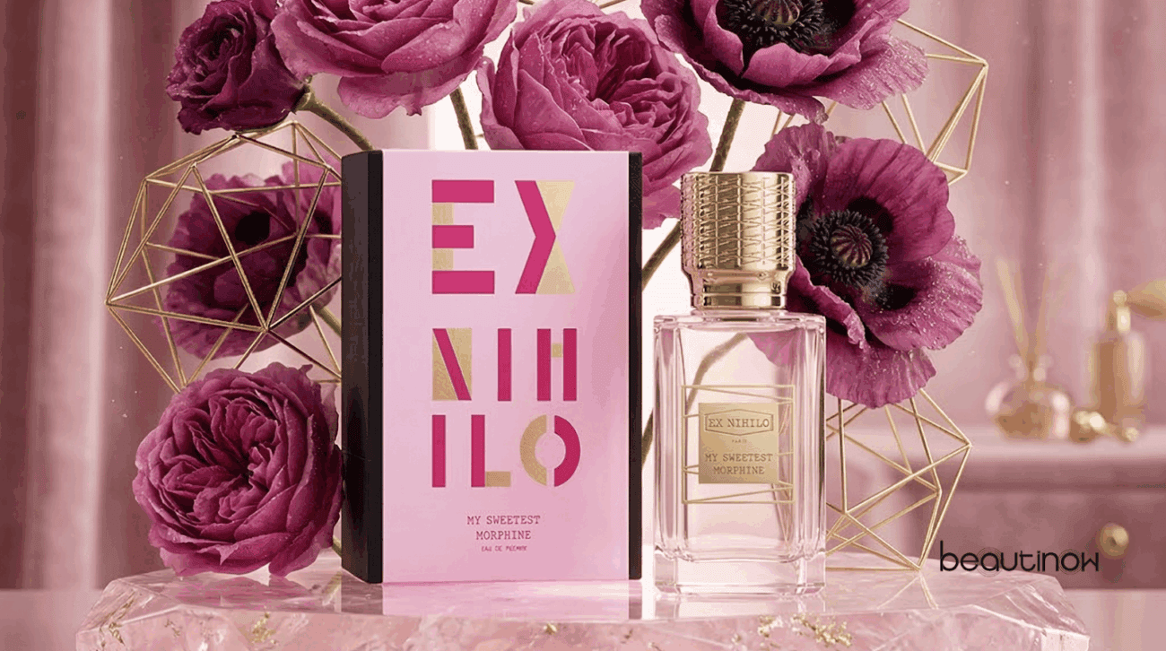 Eau Sensuelle fragrance bottle with floral accents and gold details.