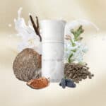 Liquides Imaginaires Blanche Bete fragrance bottle with floral and natural elements, showcasing a lu.