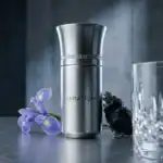 Lunatique luxury fragrance bottle with sleek metallic finish, perfect for high-end perfume collectio.